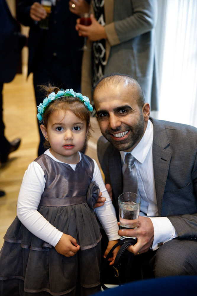 Father and daughter smiling together warmly
