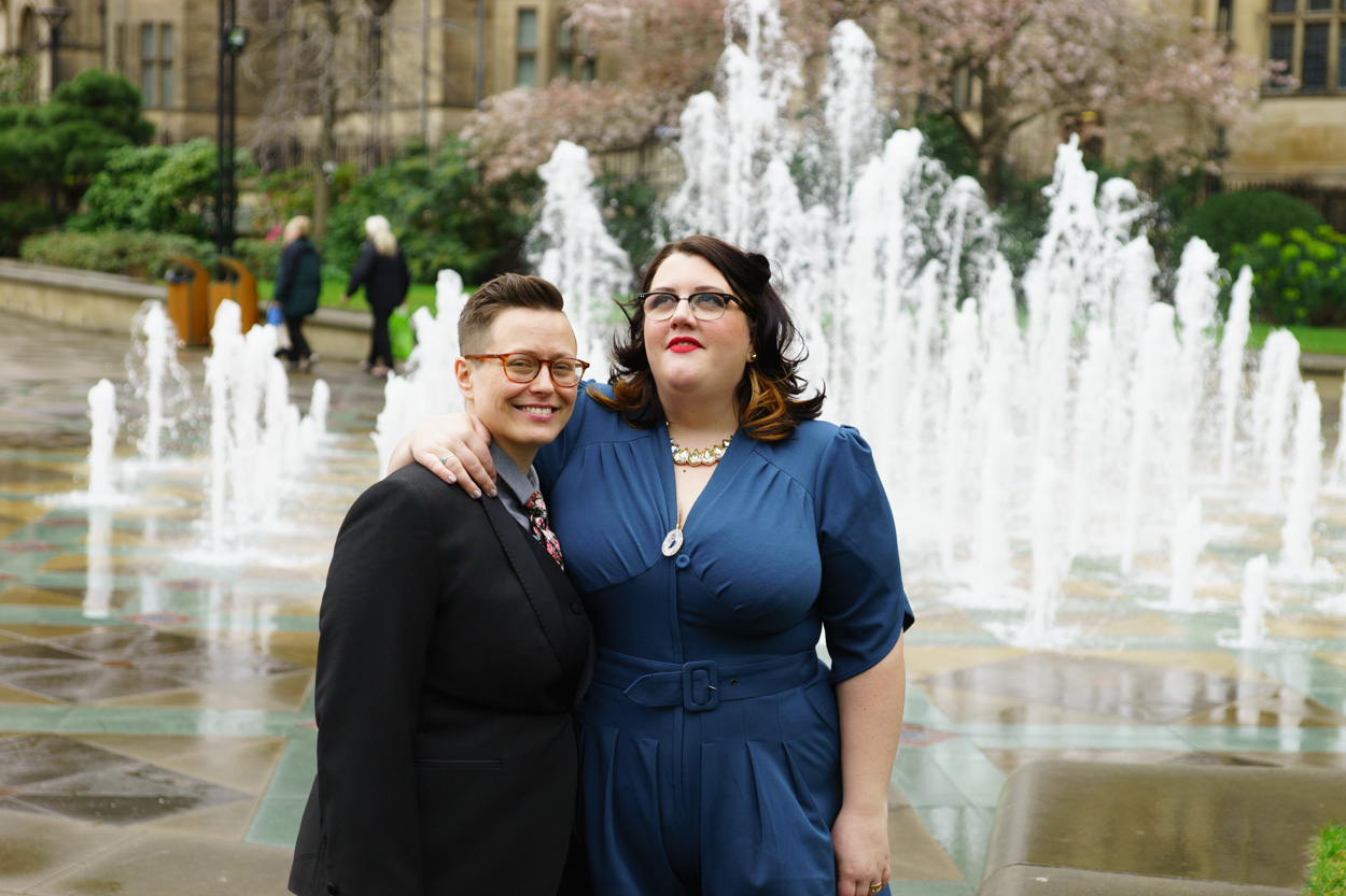 Close portrait of Lizzie and Tamara by the fountains
