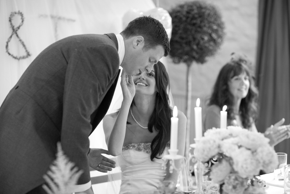 Lowri gently touches Tim’s arm during his speech