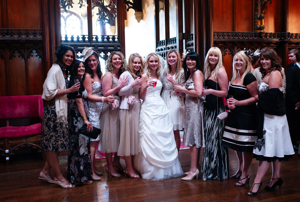 Vicky and her bridesmaids posed in the warm, elegant interior of Allerton Castle