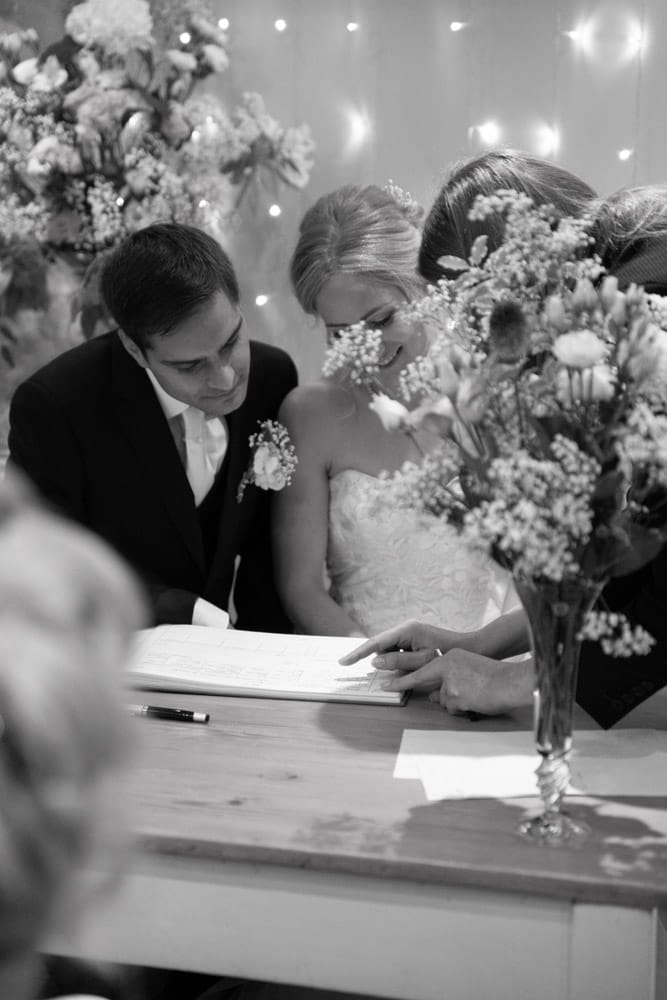 Black and white moment as the couple check the register together.