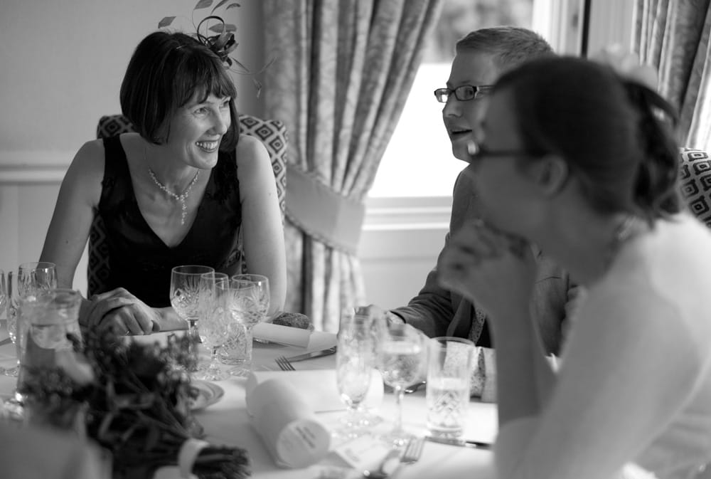 Black and white portrait — groom with his smiling mother at Weetwood Hall.