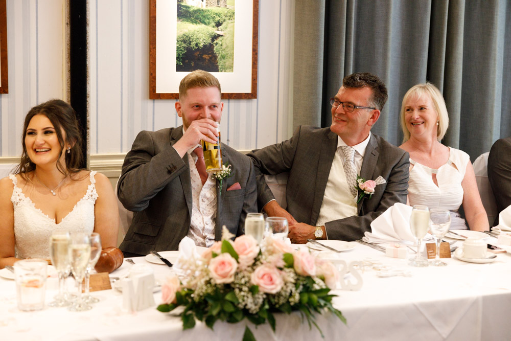 Matt takes a drink before starting his speech, relaxed and smiling at Chevin Lodge.