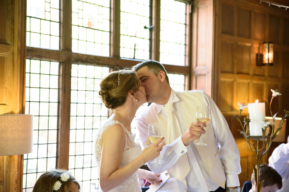 Couple share a kiss as the bride’s speech comes to a close.