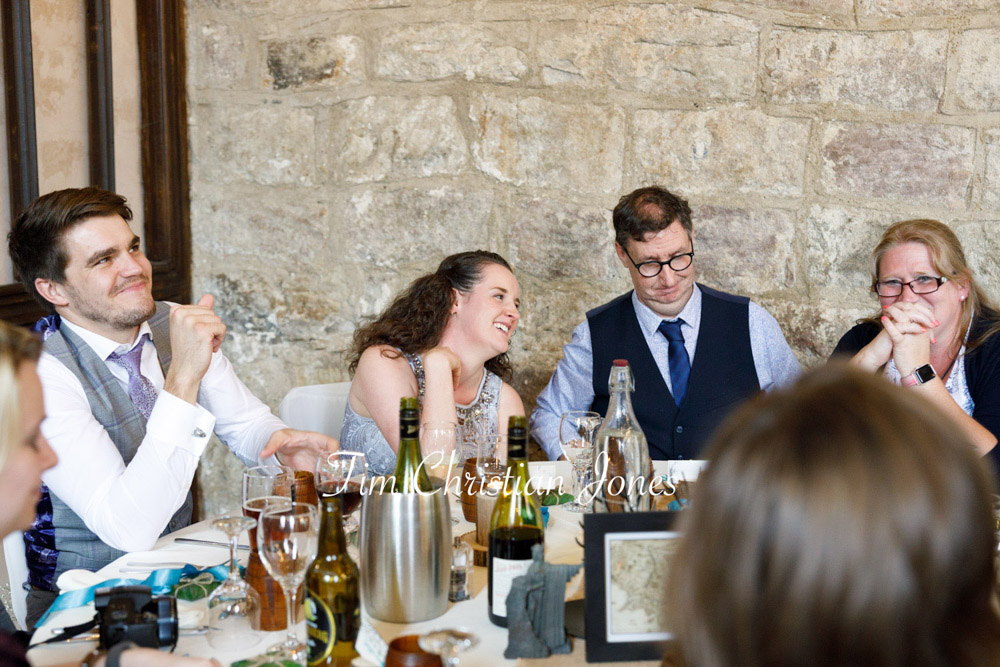 Candid photo of happy guests during Yorkshire wedding reception.