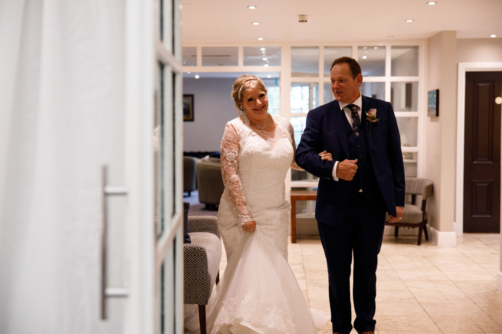 Tracy and Gary outside the reception marquee, ready to enter.