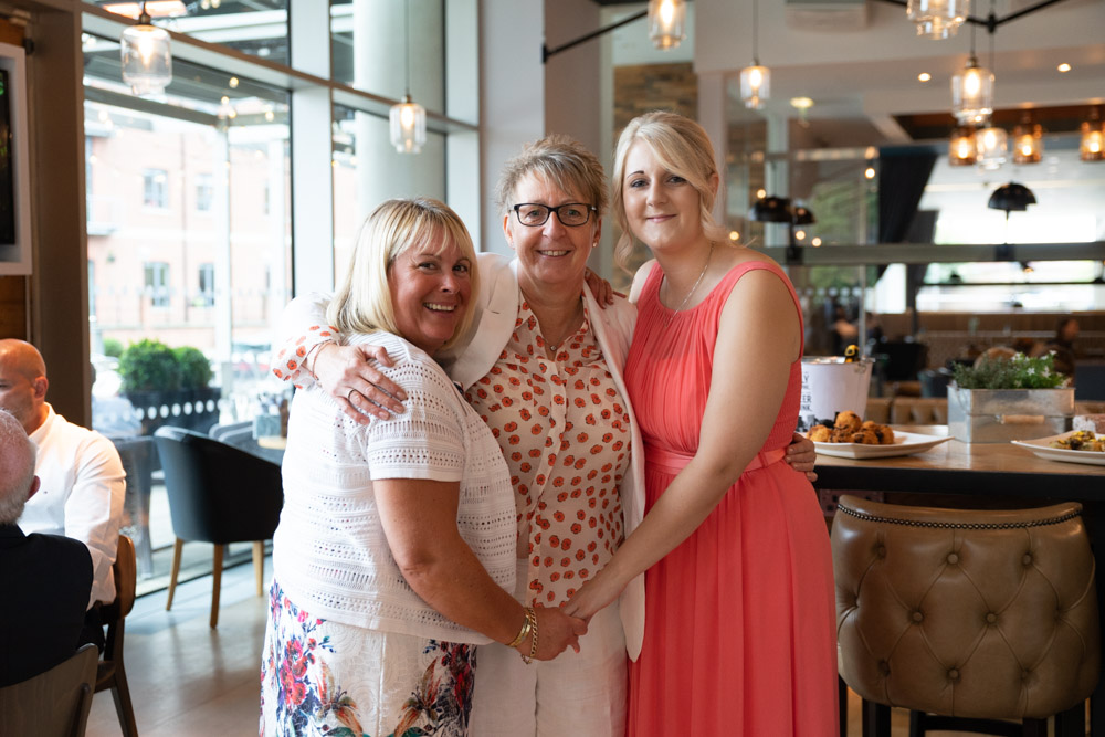 Clare’s daughter replaces a guest in a new group photo
