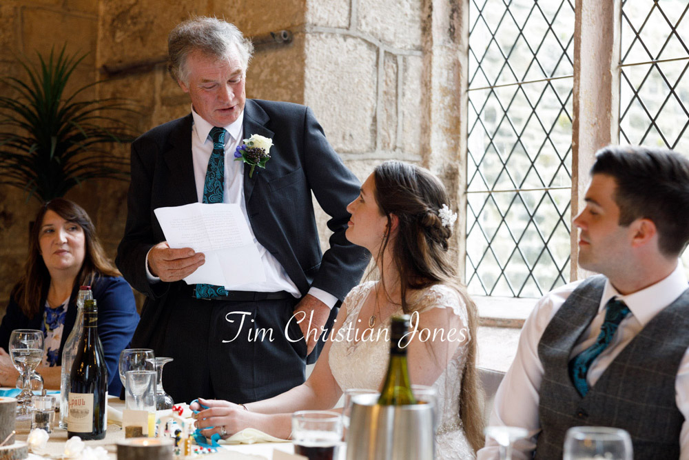 Proud father delivers wedding toast during Yorkshire celebration.
