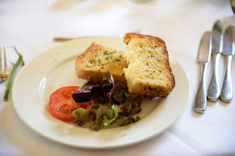 Salad with toasted garlic bread served as a starter.