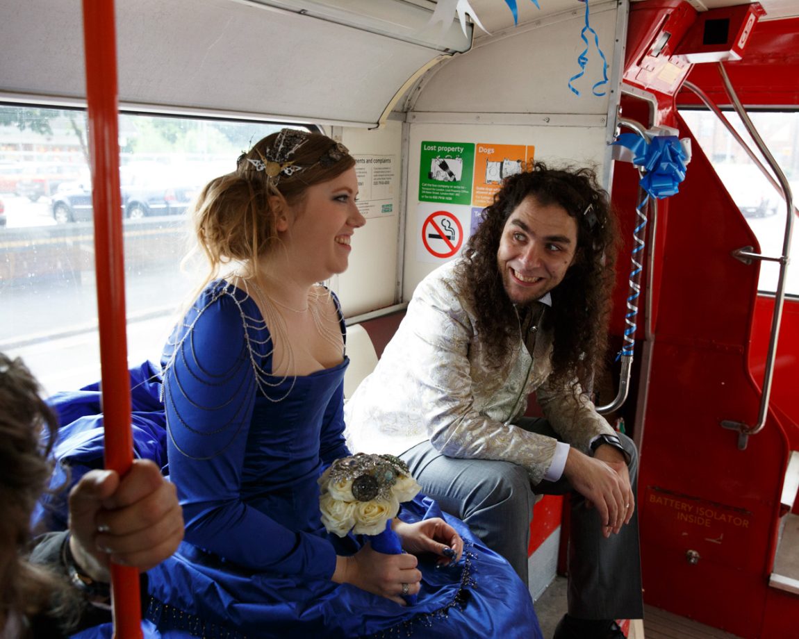 094 couple sat on the bus smile left bank leeds wedding reception linsey and chris