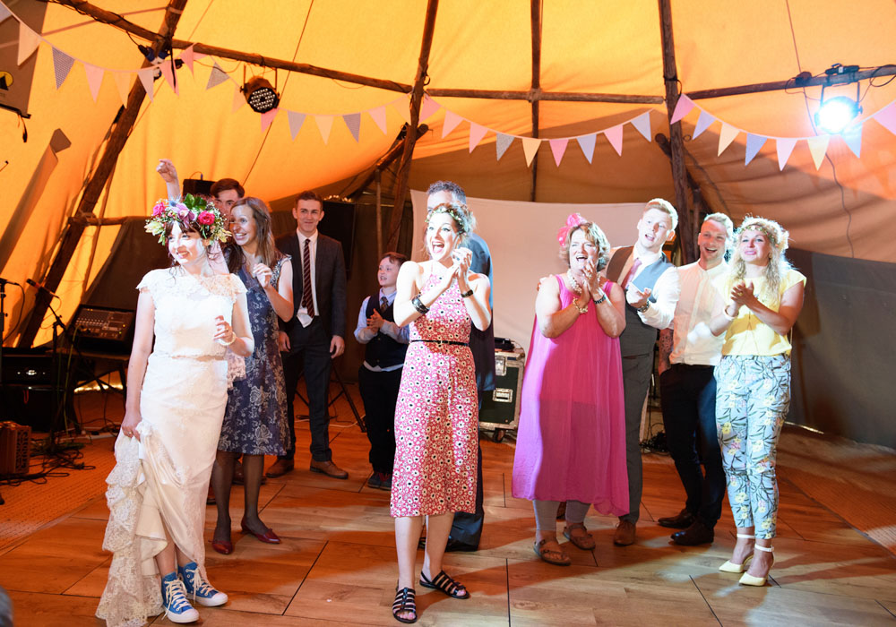 Guests applaud after a round of ceilidh dancing.