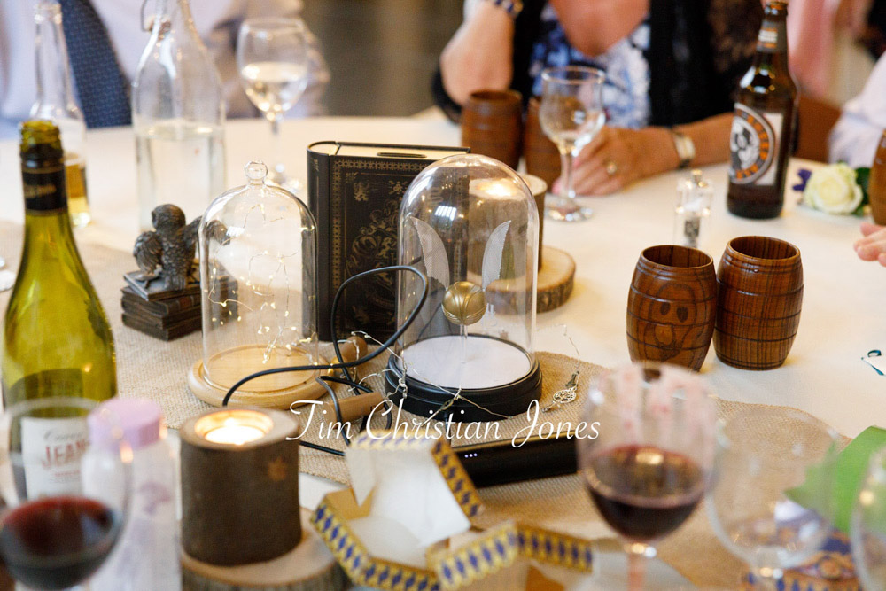 Candid scene of wedding breakfast table chaos.