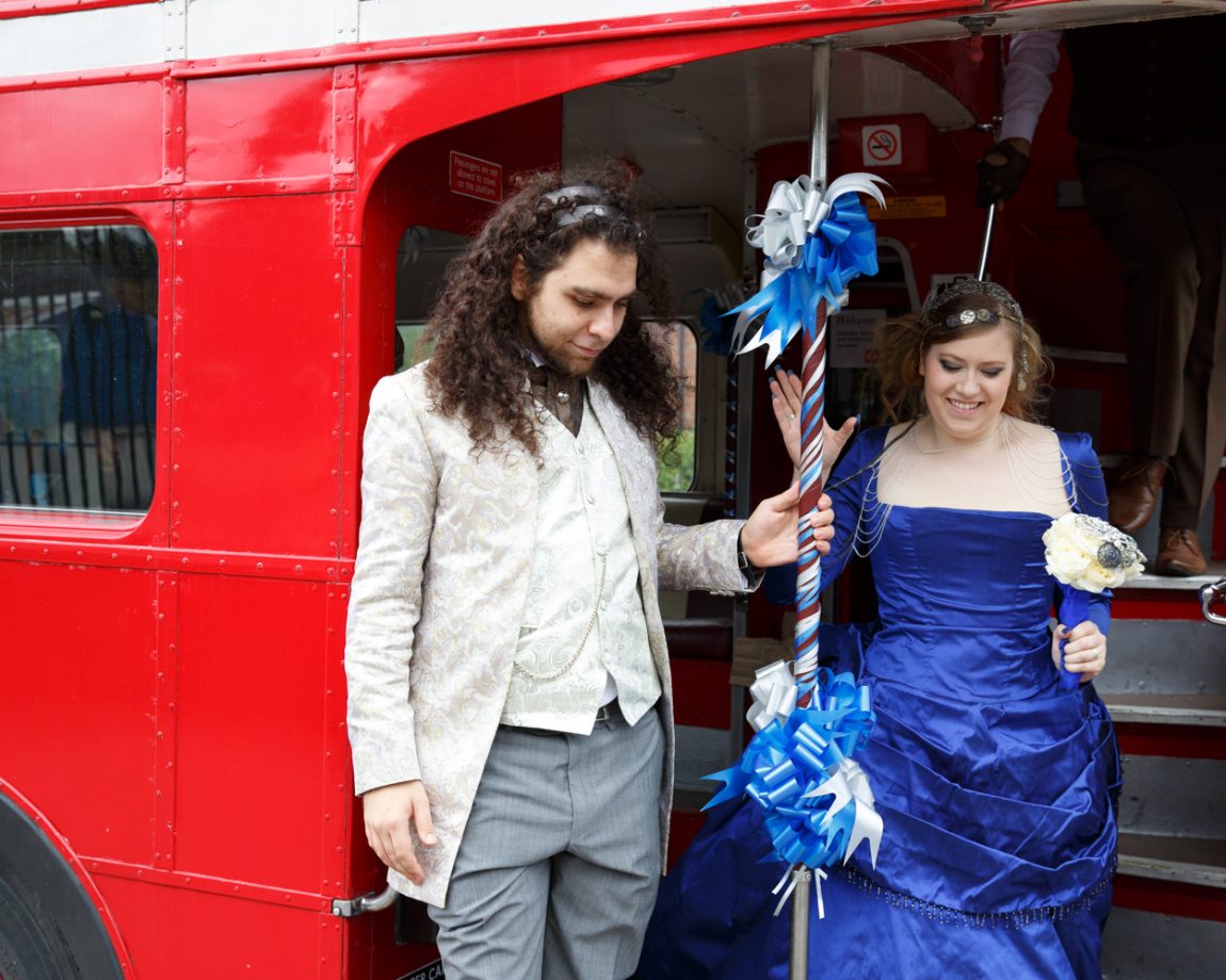 097 the couple step down from the red bus left bank leeds wedding reception linsey and chris