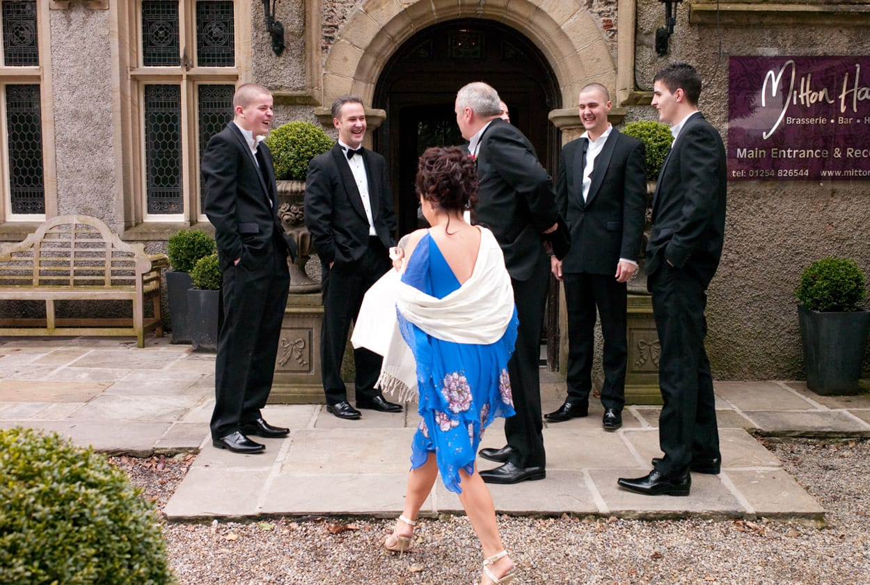 Groom and sons gathered outside Mitton Hall preparing for their requested posed shot.