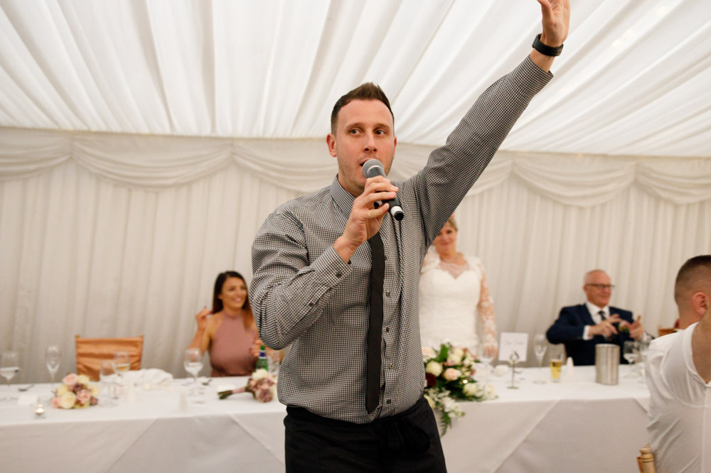 Second singing waiter joins in, duet in full swing.