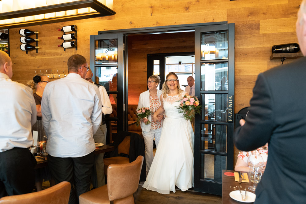 The couple arriving at Fazenda Leeds for their wedding breakfast