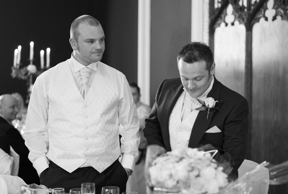 The two best men rise to begin their wedding speech