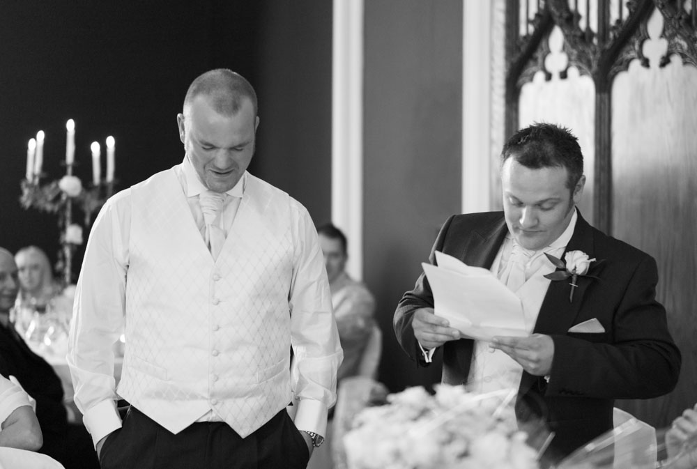 The best men continue their cheeky speech as the room laughs