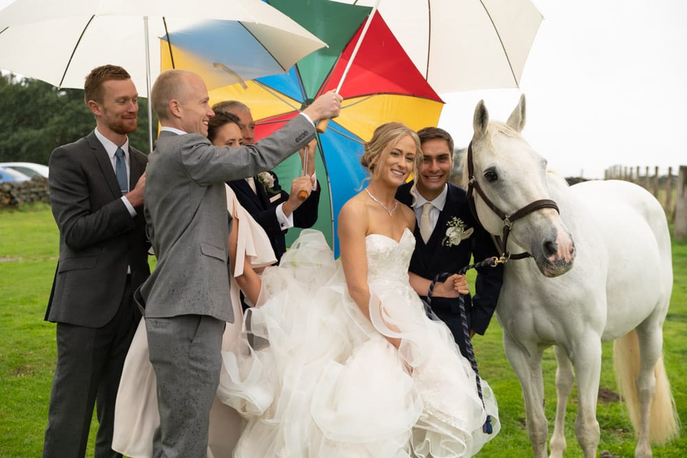 144 chilli barn otley couple umbrellas horse helen adam