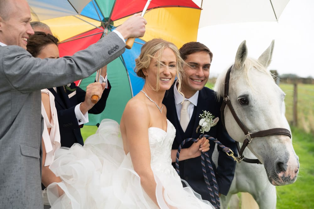 145 chilli barn otley couple umbrellas horse helen adam