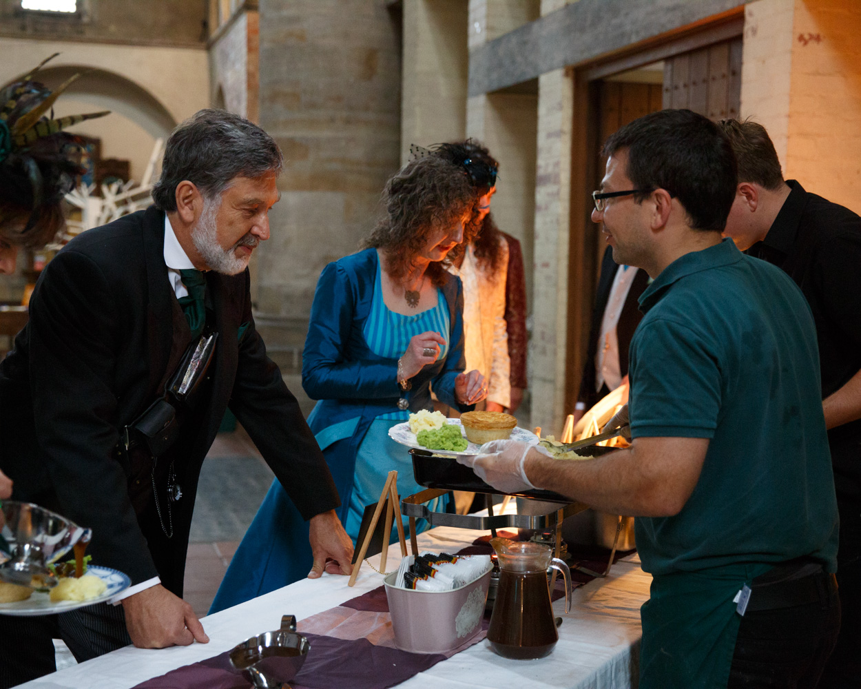 Guests enjoy pie, mash, and gravy during the relaxed buffet