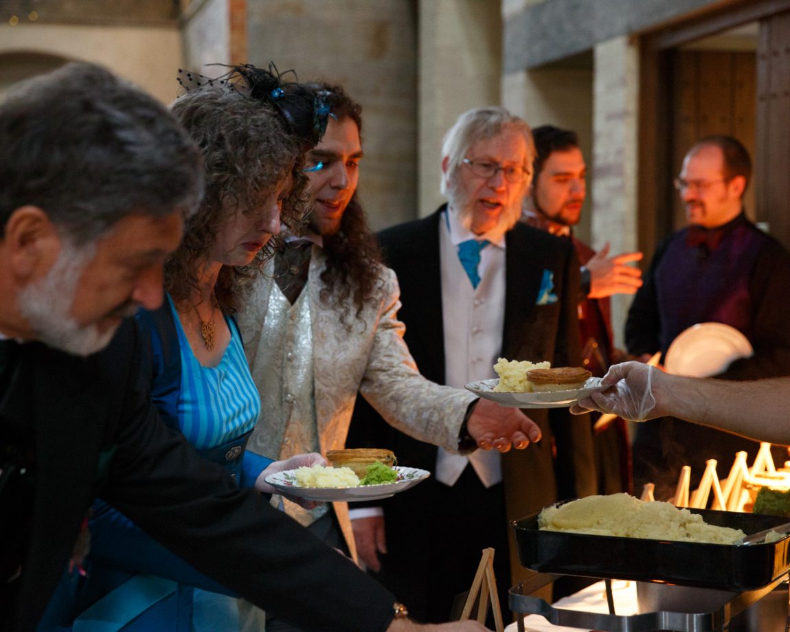 146 groom is handed his pie and mach left bank leeds wedding reception linsey and chris