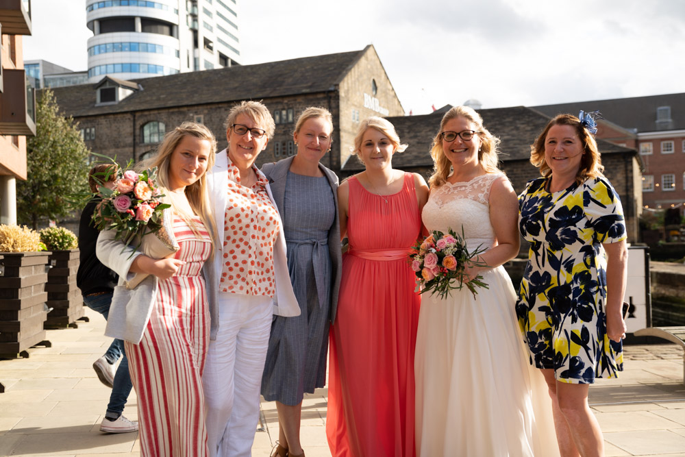 Guests stepping into the sunshine for another group photo