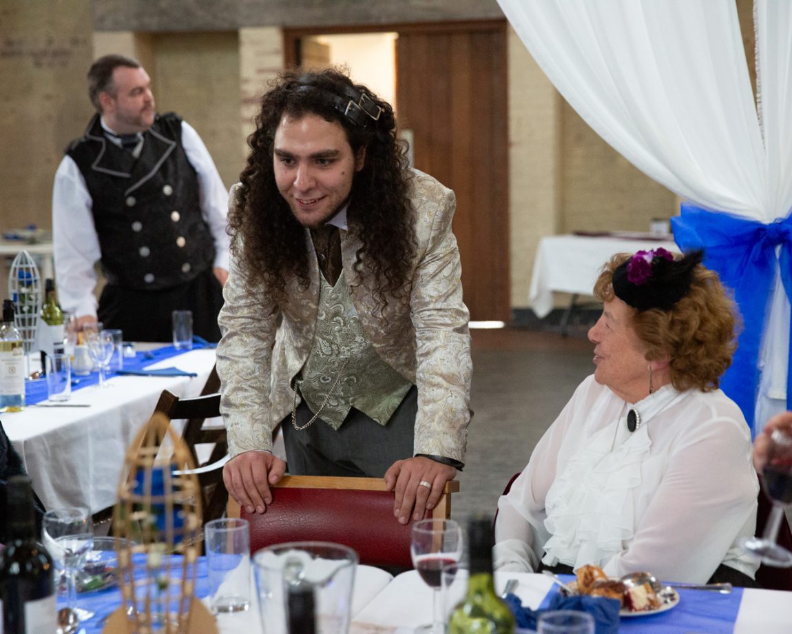 162 groom chats with guests around the tables left bank leeds wedding reception linsey and chris