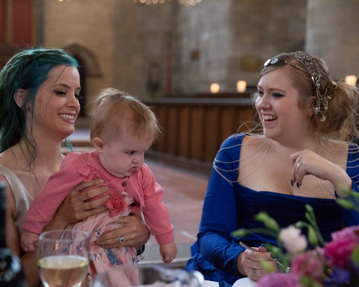 166 linsey smiles at cute baby left bank leeds wedding reception linsey and chris