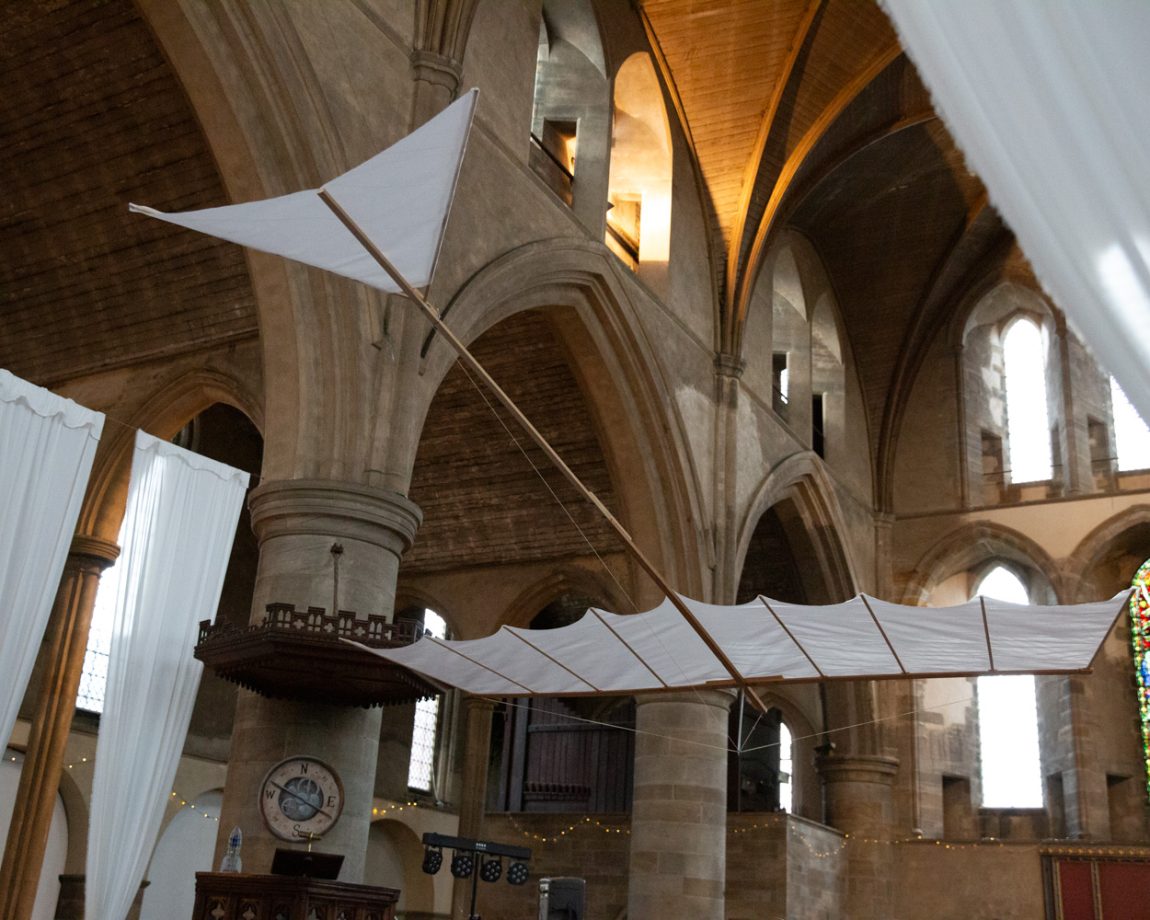 173 mock plane hanging from the rafters left bank leeds wedding reception linsey and chris