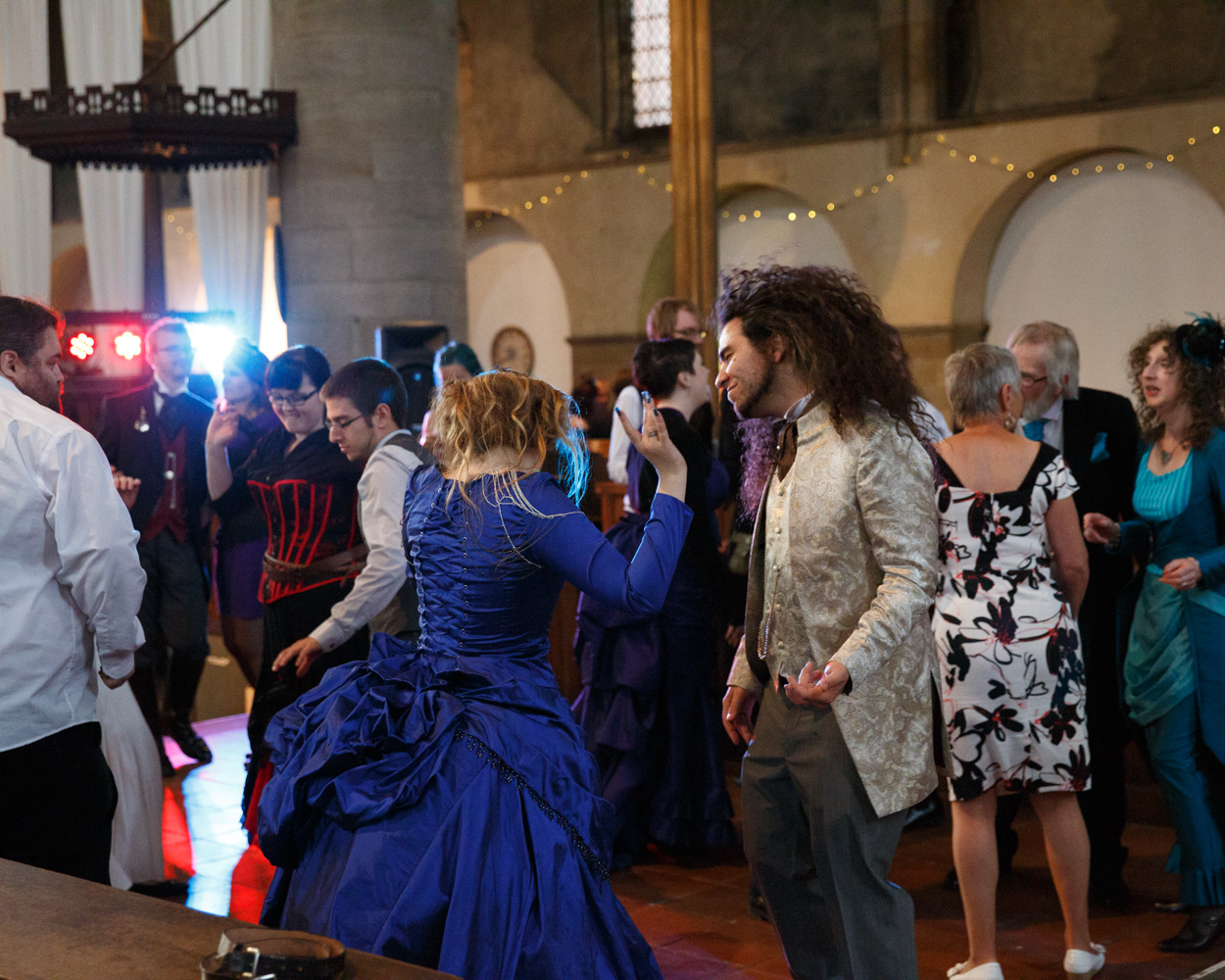 Friends join the dance floor as the evening fills with movement and joy