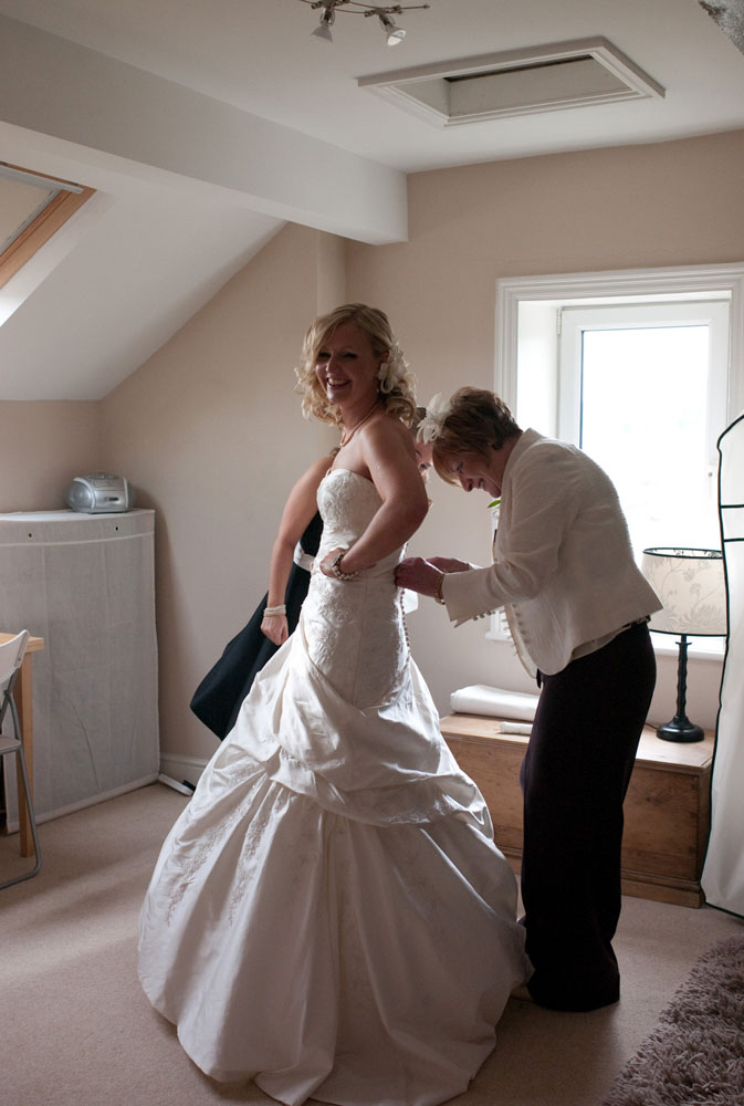 Dani, the bride looks into the camera