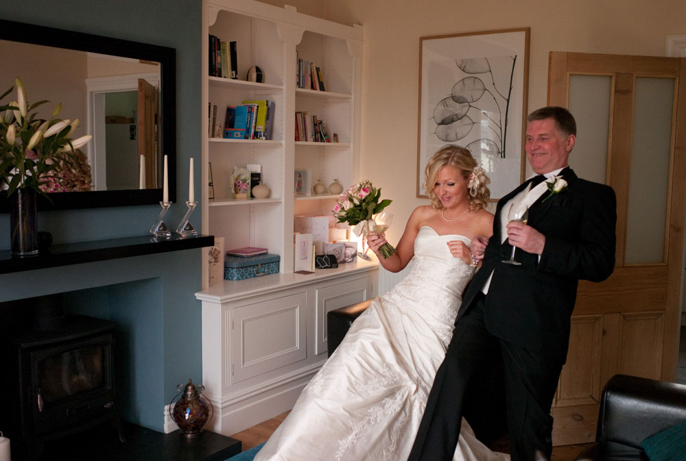 Bride and her father do a funny practice walk - Hoyle Court wedding photography