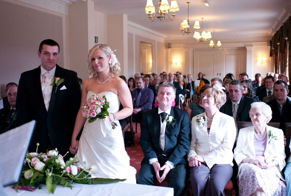 The couple begin the ceremony - Hoyle Court wedding photography