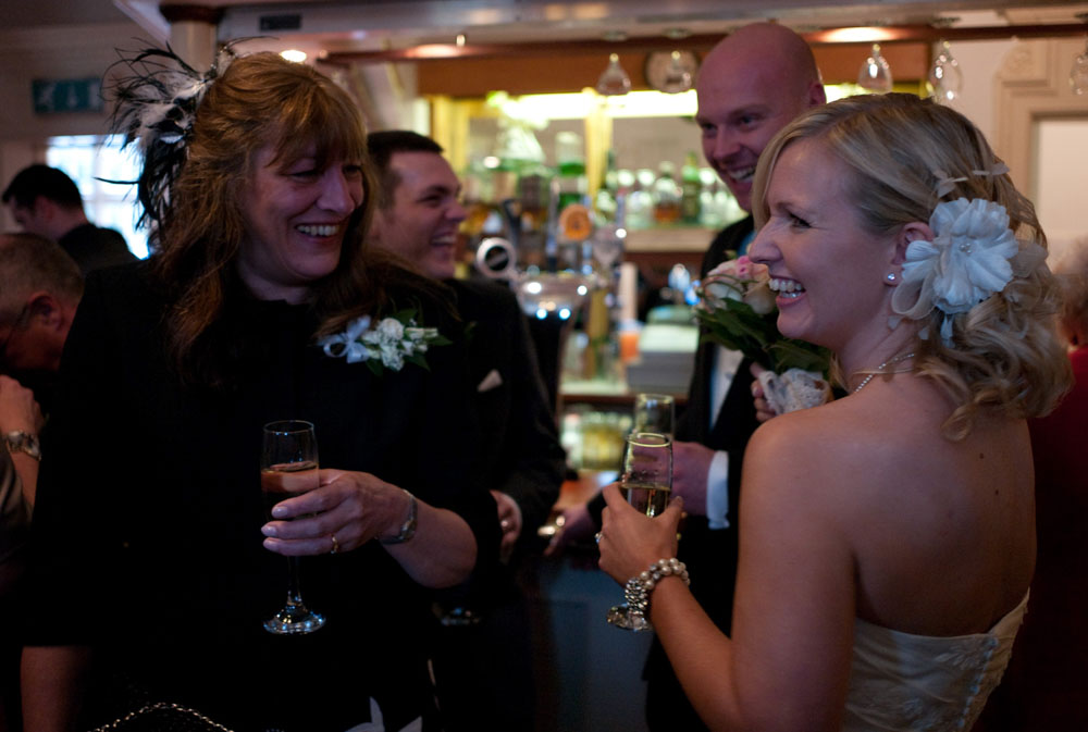 The couple mingle and chat after the ceremony