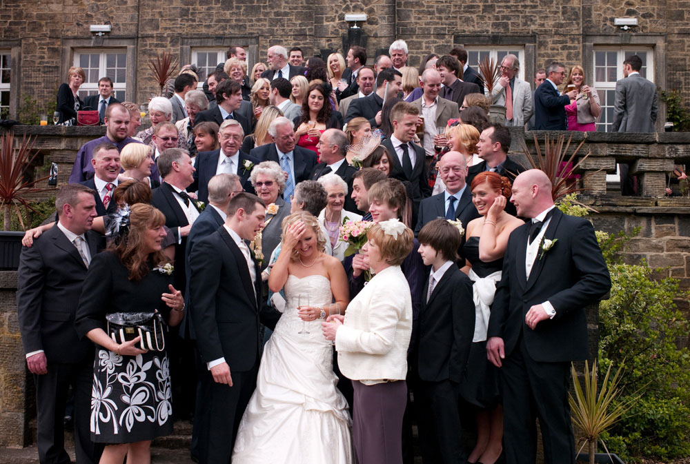 Everyone chats making a fun shot of everyone - Hoyle Court wedding photography