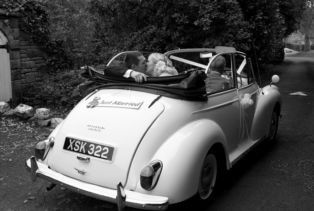 The couple leave for scenic photos in an open top beetle