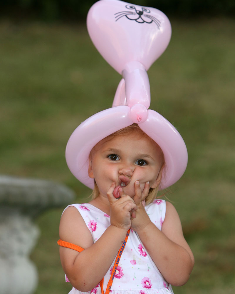 Bridesmaid squeezing her cheeks