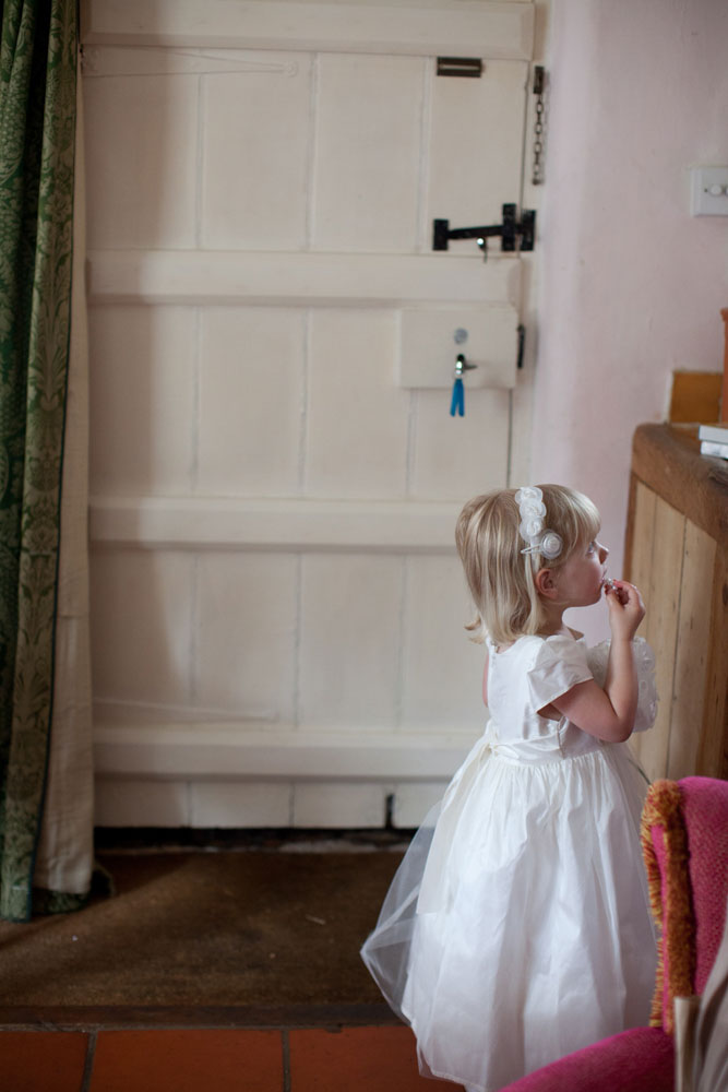 Bridesmaid by the cottage door