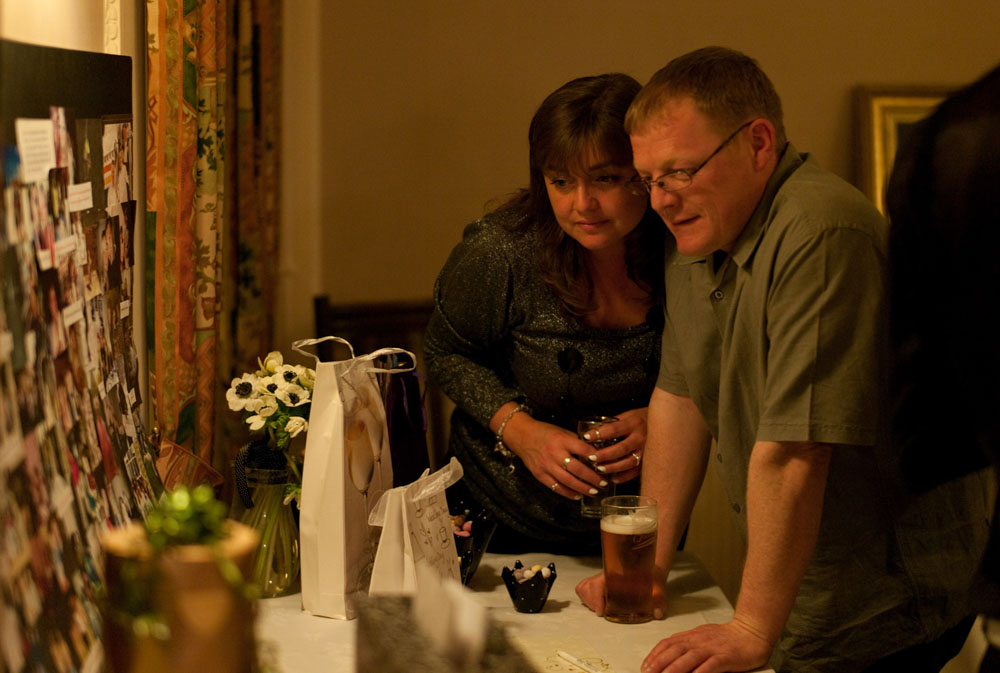 Guests at the gift table during the evening reception