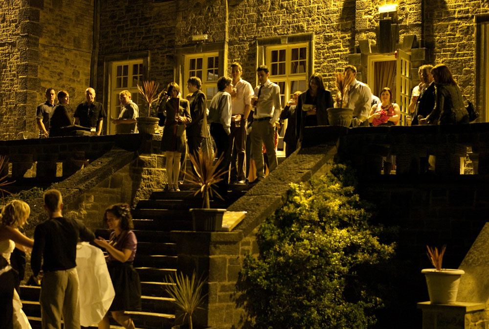 Wedding guests on the balcony area at the venue