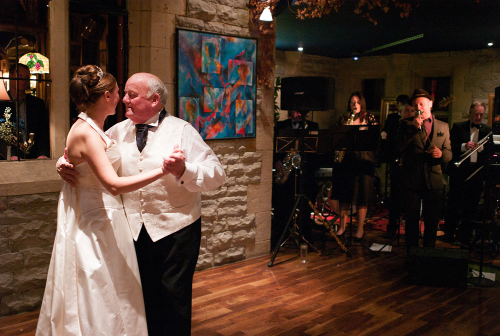 The bride and proud father first dance