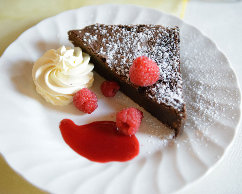 Detail and Colour  - Chocolate cake with raspberries and cream. Yum Yum - Leeds wedding photographer