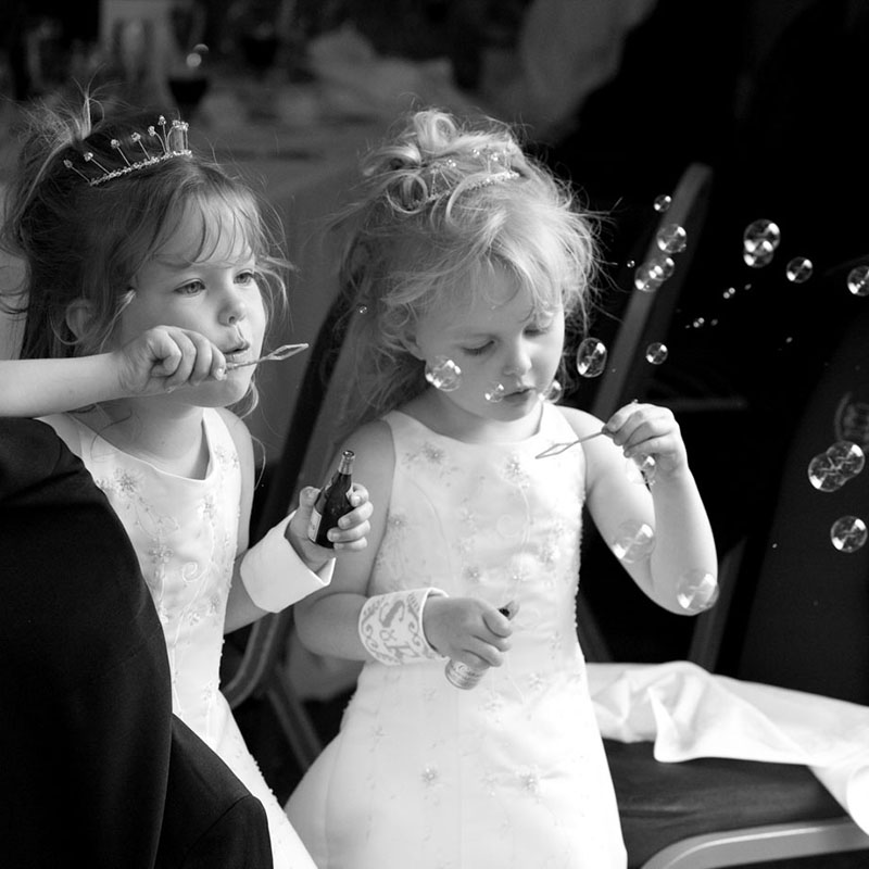 Leeds wedding photographer - Bridesmaids blowing bubbles