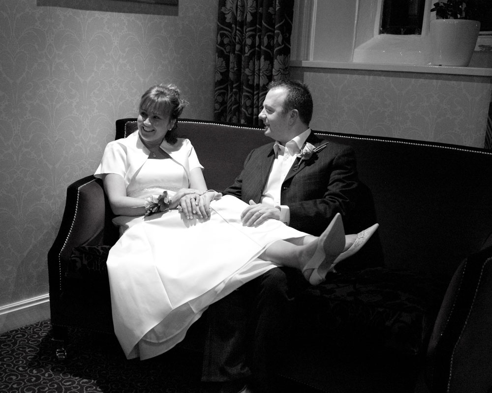 The couple on the sofa by Leeds wedding photographer