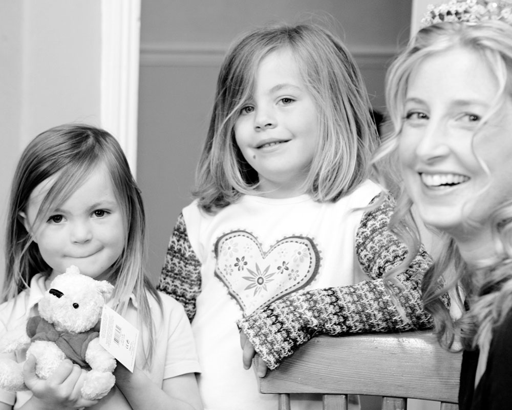 The bride and kids in black and white by Leeds, West Yorkshire wedding photographer