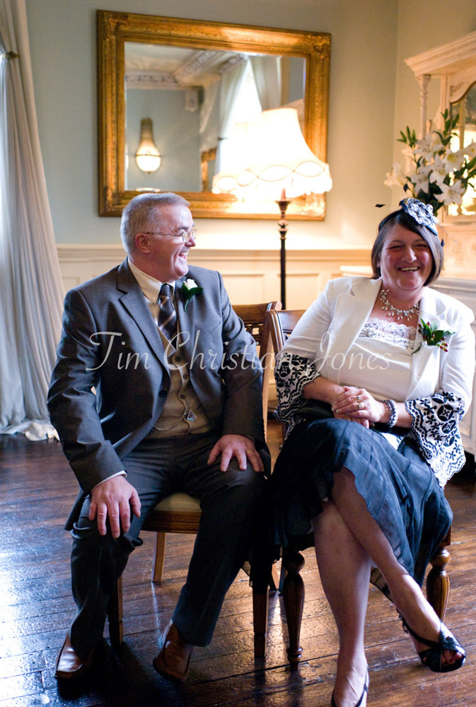 A calm portrait of Julie’s father with his wife — a moment of quiet strength and love.