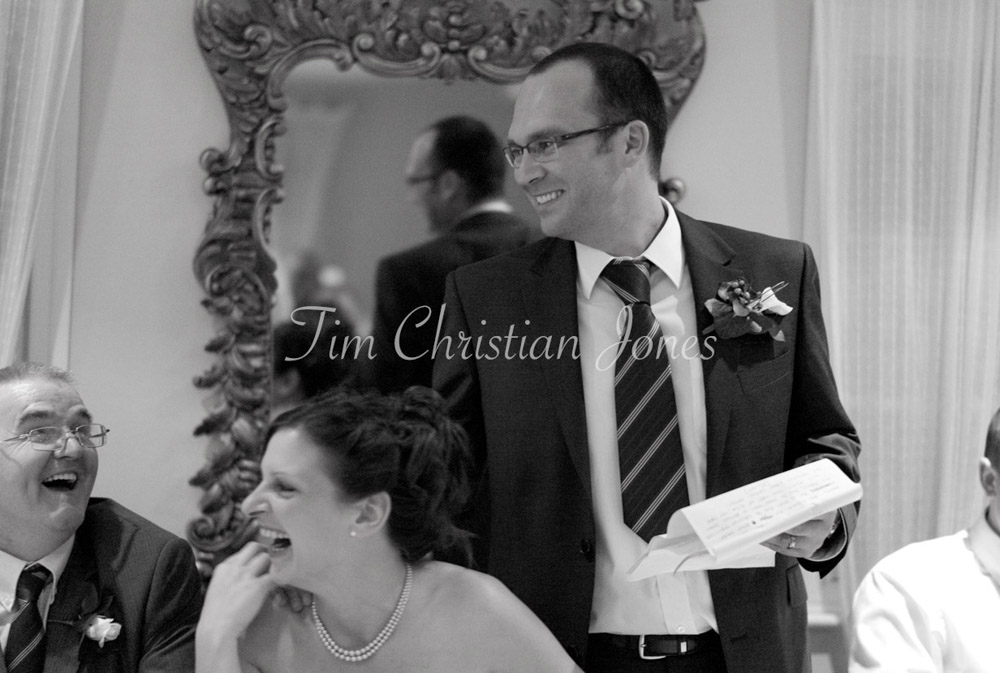 Pat’s speech draws laughter and smiles from guests seated along the top table.