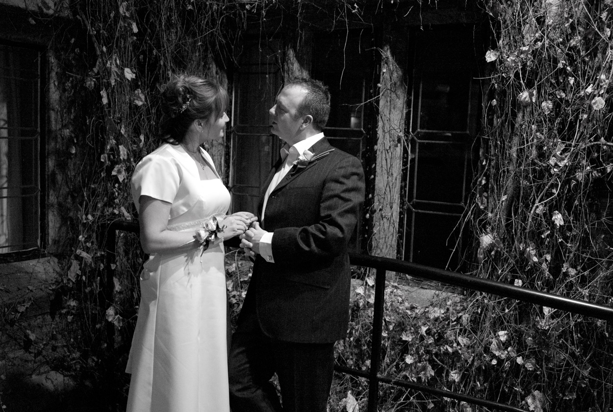 Couple facing each other outside in monochrome