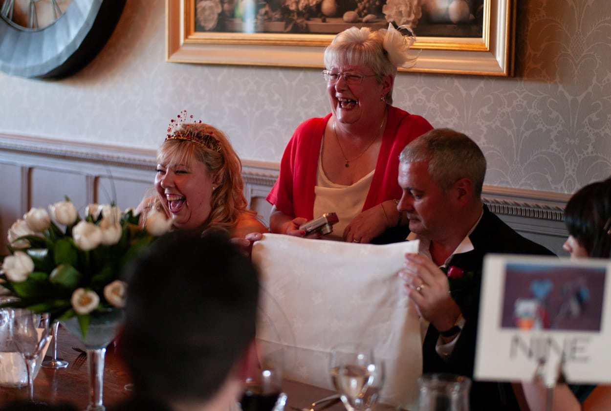 Nikki laughing at the top table during the speeches.